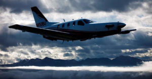 Plane flying in clouds